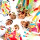 smiling kids with colourfull hands